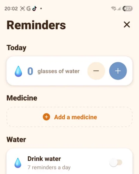 The reminders screen showing glasses of water, a medicine section and water reminders every two hours